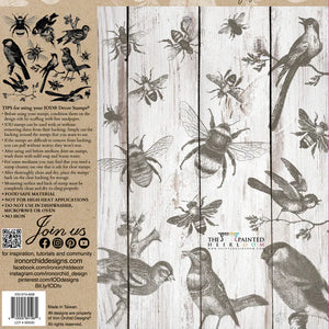 Stamp di uccelli e api mediante disegni di orchidee di ferro